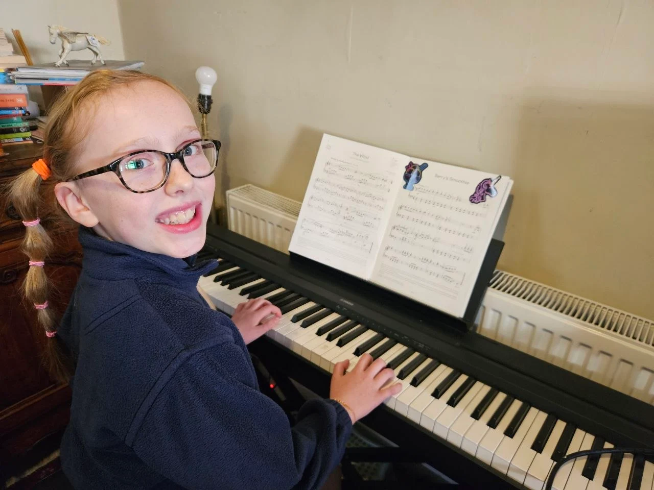 Student playing piano