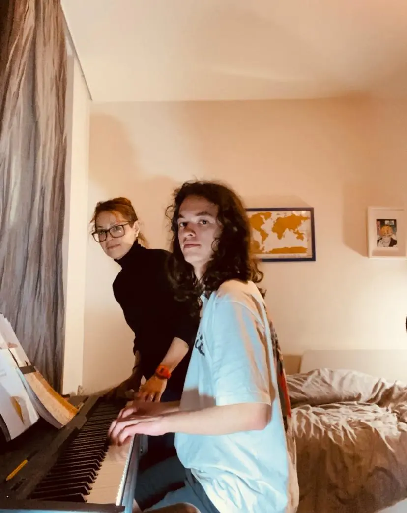 Mother and son at piano