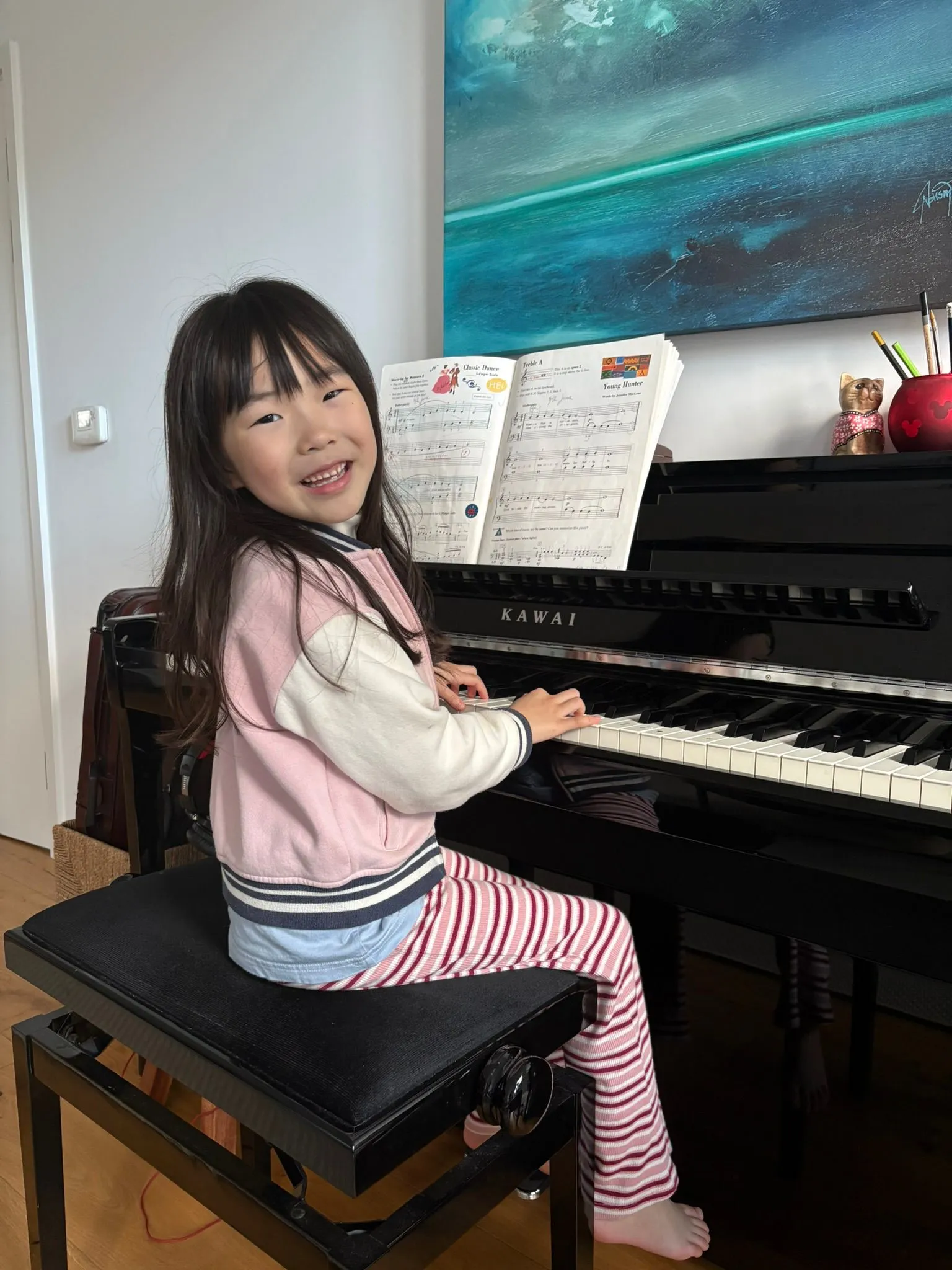 Young student at Kawai piano